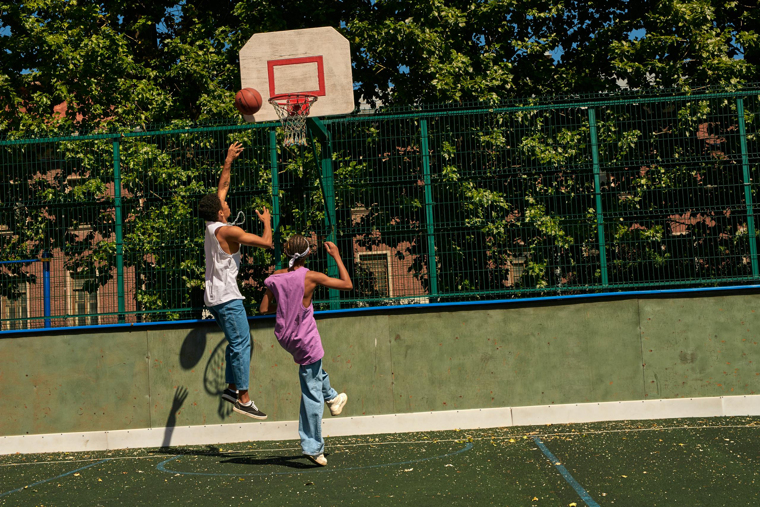 Two Men Playing Basketball